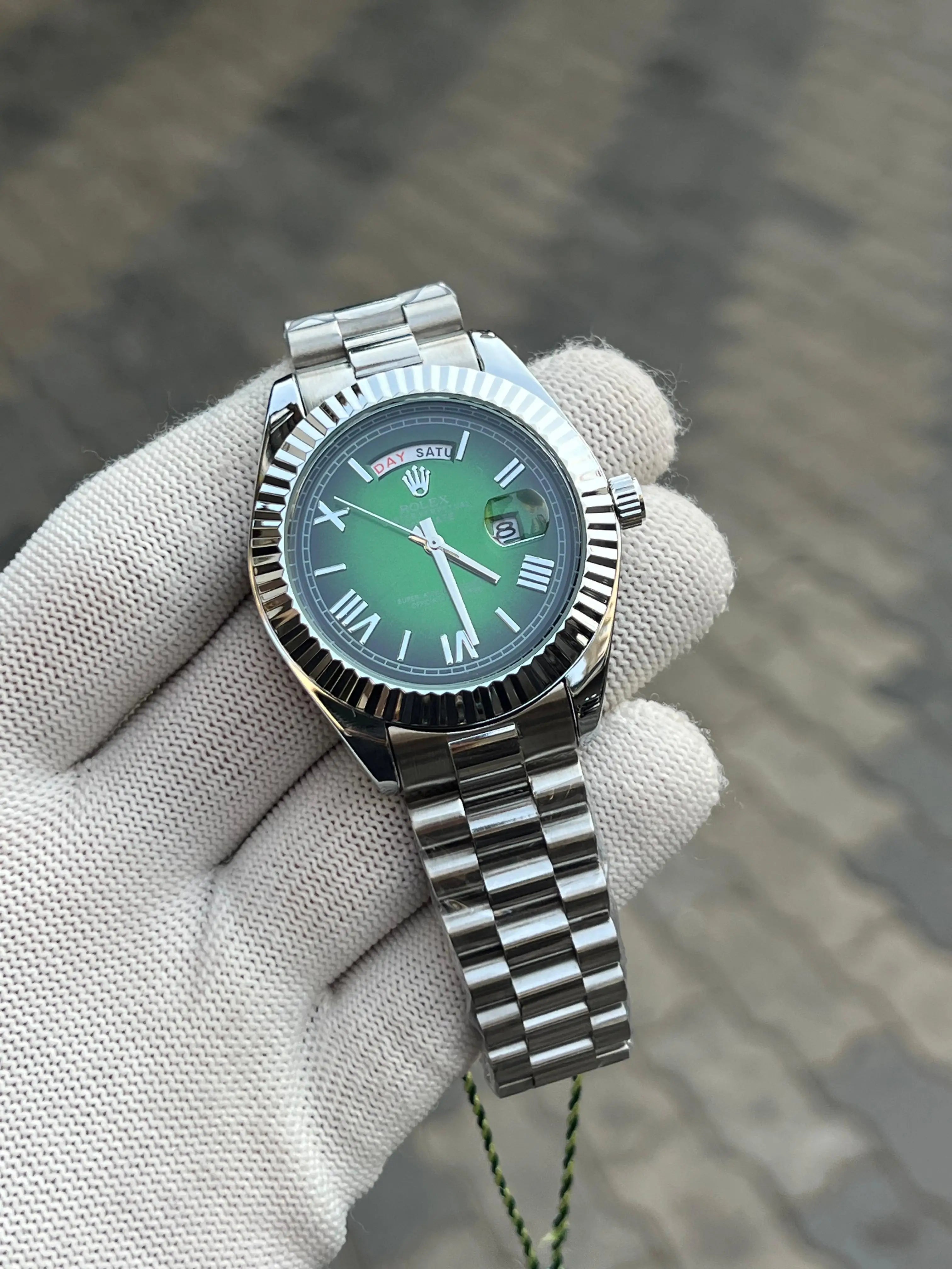 rolex.. Day Date Silver Green Roman Dial
