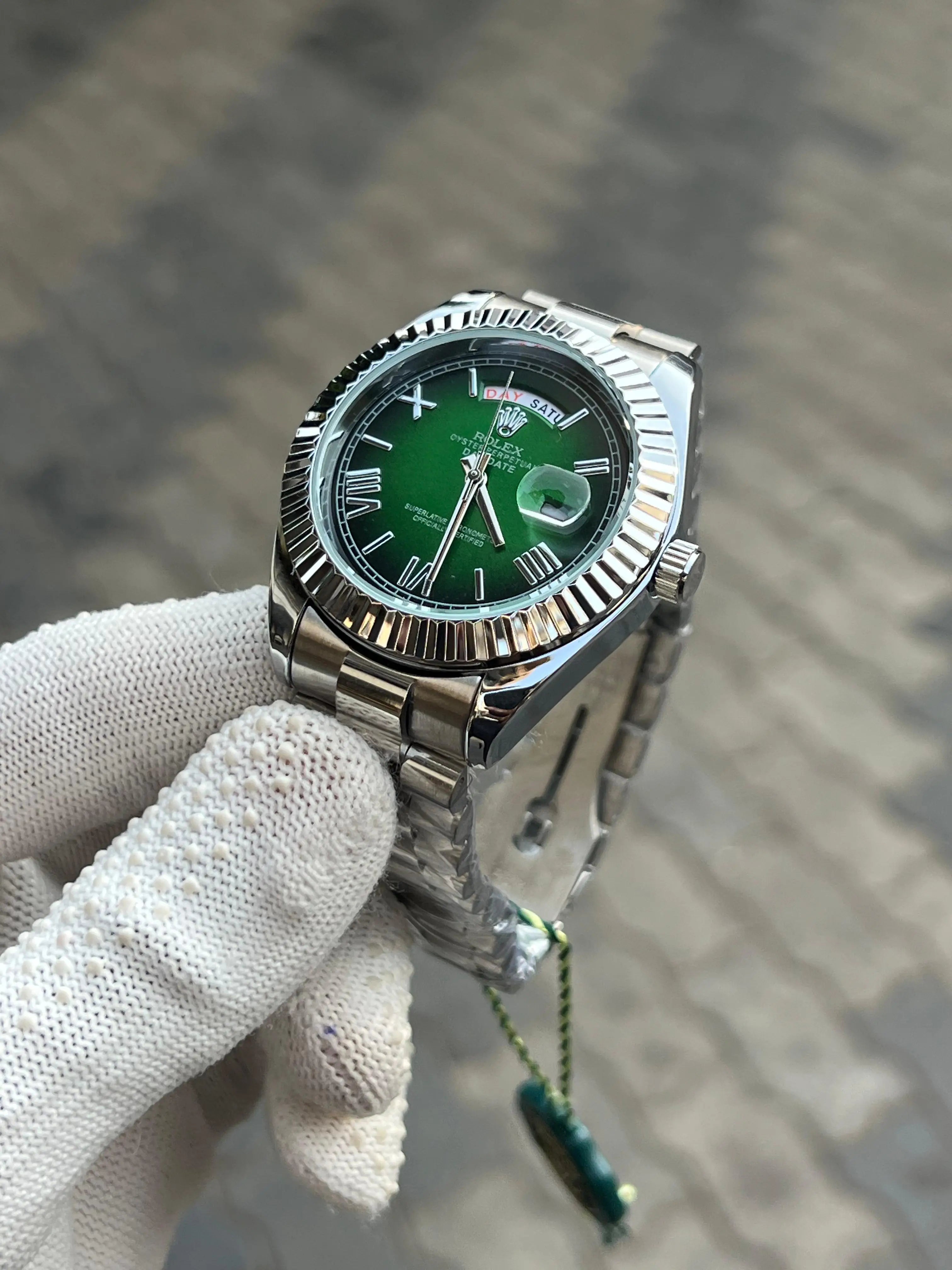 rolex.. Day Date Silver Green Roman Dial